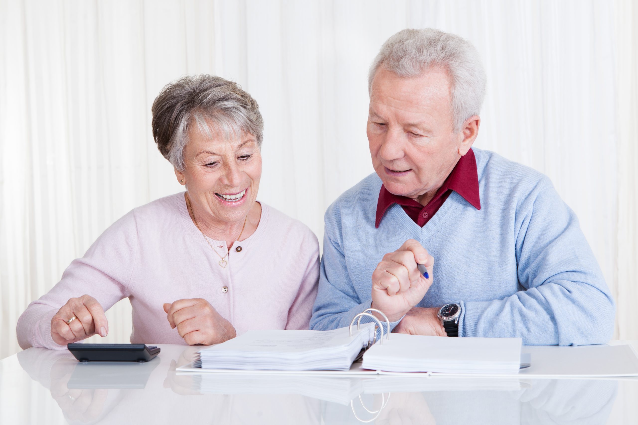 Senior Couple Calculating Budget Retirement Planning with the 2025 Social Security Adjustments